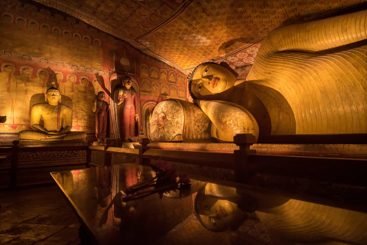 Dambulla Cave Temple ancient Buddha statues and murals